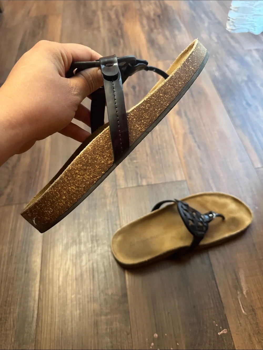 Tory Burch Miller Cloud sandals feature a black patent leather